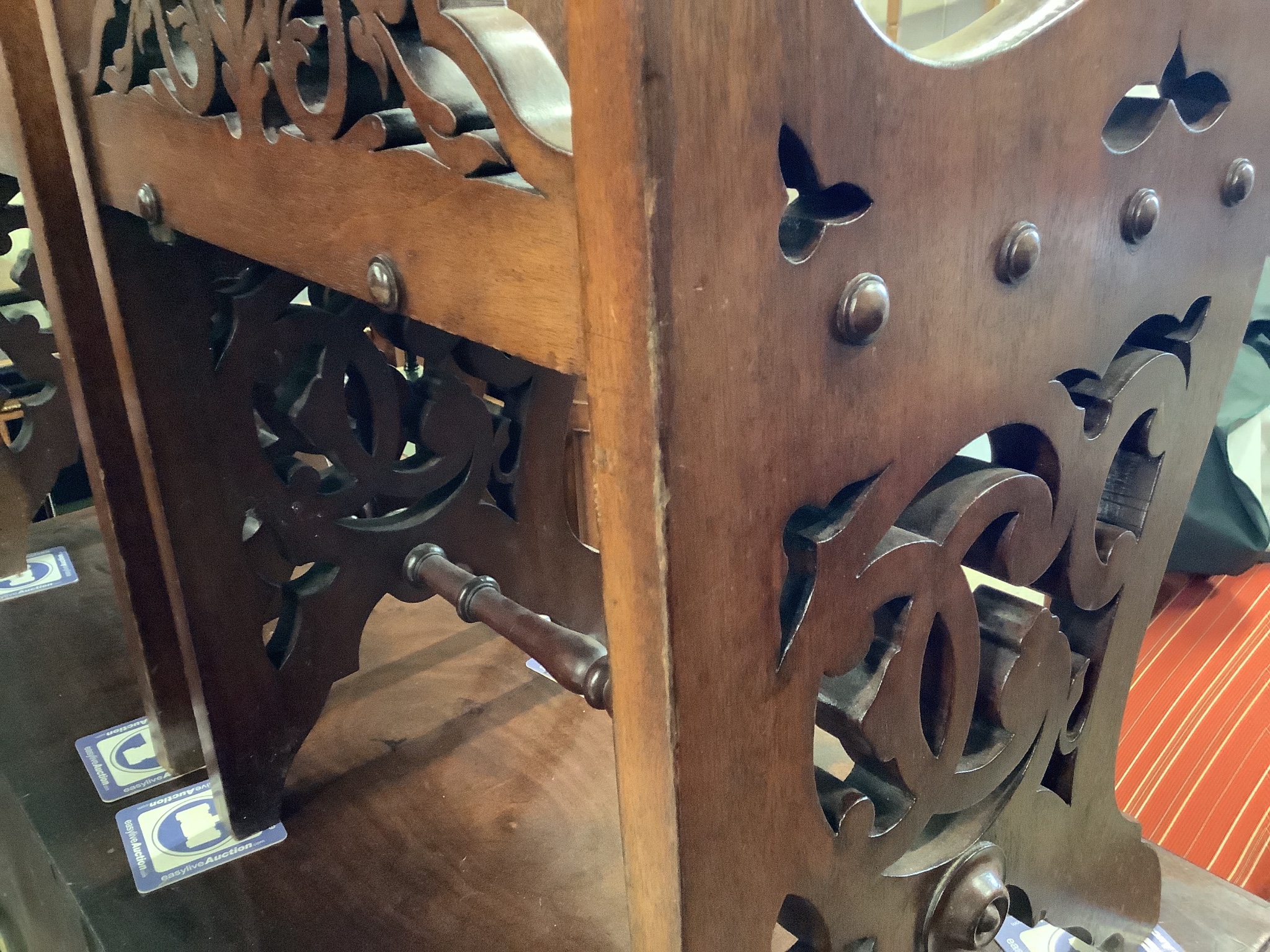 A pair of Victorian style mahogany hall seats in the manner of Shoolbred. W-47, D-38, H-76cm.